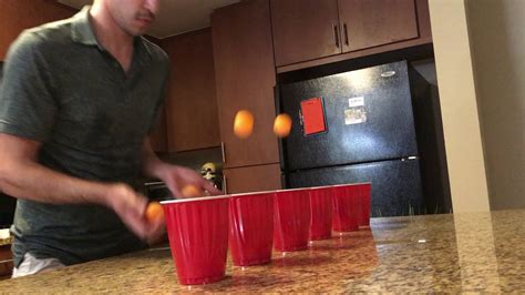 Bouncing Ping Pong Balls Into Cups World Record Youtube