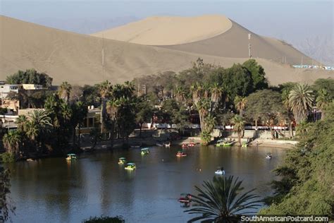 Amazing Place Huacachina With A Lagoon And Huge Sand Crater Photo