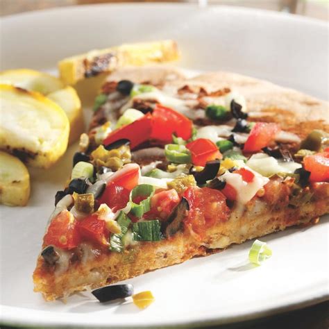 Not just your average nachos. Black Bean Nacho Pizza Recipe - EatingWell