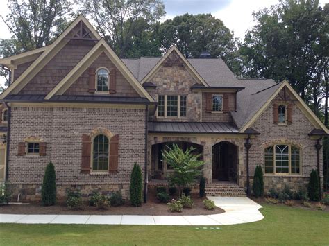 White Brick House With Stone Accent Ranch Style House With Siding And