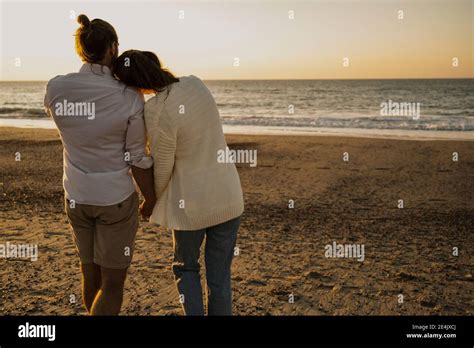 Romantic Couple Beach Walking Hi Res Stock Photography And Images Alamy