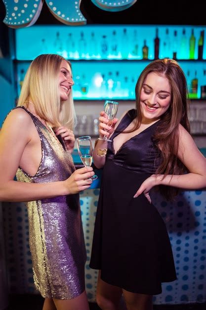 premium photo female friends enjoying at nightclub
