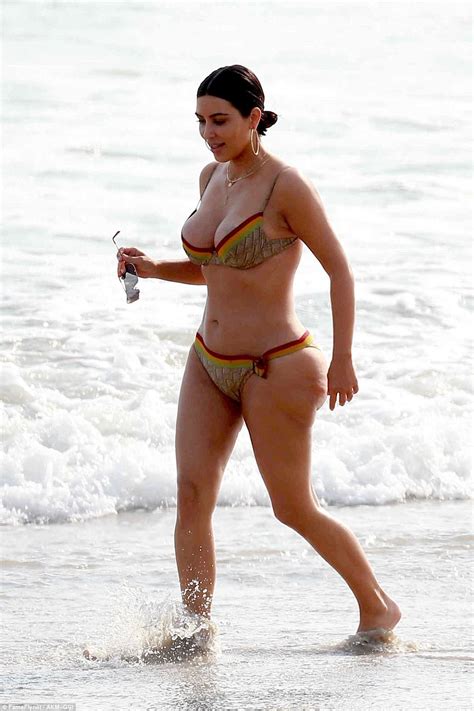Kim Kardashian Busts Out Of Her Skimpy Bikini Daily Mail Online