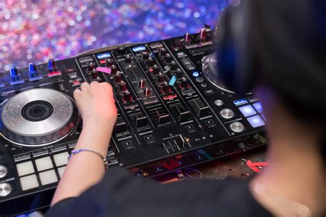 He has won countless dj competitions such as the red bull music 3style dj battle twice, and has. Dj is rhythm music with controller and mixer | Premium Photo