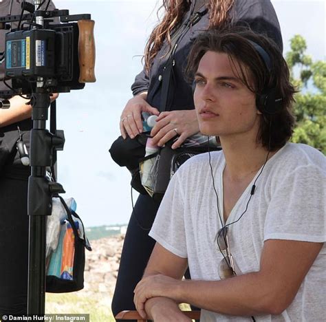 Shirtless Damian Hurley Frolics In The Sea With Pal Millie Griffiths