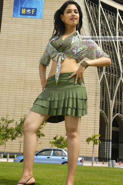 Actress Tamanna Photo Gallery Hips And Legs Show In Mini Skirt