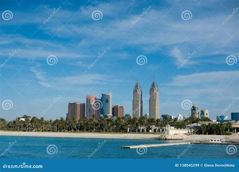 The View From The Water On The Dubai Beach And Palm Trees Stock Image