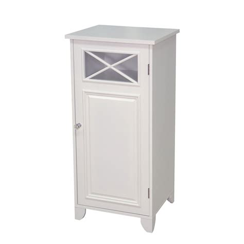 In this bathroom, white coats every surface, except the wood vanity, to maximize the bright, expansive effect. 12 Awesome Bathroom Floor Cabinet with Doors - Review