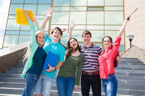 Excited Students With Arms Outstretched Stock Photo Image Of Adult