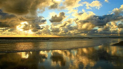 1907x1080 Beach Sunset Reflection Clouds Sea Coolwallpapersme