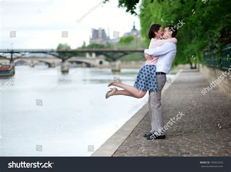 Happy Romantic Couple Hugging Near Seine Stock Photo 105923333