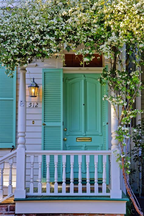 Pair shutter dog black wrought iron propelier wood | renovator's supply. 8 Unusual Colors You Haven't Considered For Your Front Door (But Definitely Should) | HuffPost