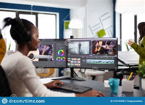 African Video Editor Working With Footage And Sound Stock Photo Image