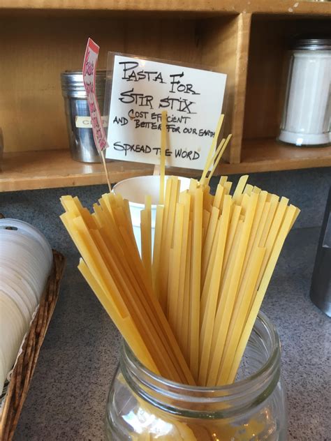 a coffee shop that uses reusable uncooked pasta instead of wooden sticks for stir sticks ...