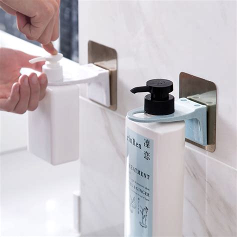 Here is a shower shampoo holder with integrated soap dish. Wall Mounted Magic Sticky Shampoo Hook Shower Hand Soap ...