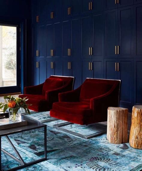 This merlot velvet sofa elevates any space with its sharp tuxedo silhouette, diamond tufted details and bolster accent pillows. Pin by Sara Neer on Living Room | Red interior design, Velvet living room, Red chair living room