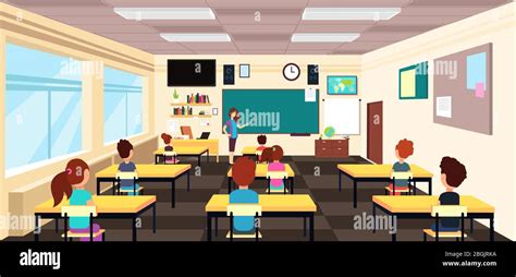 Teacher At Blackboard And Children At School Desks In Classroom