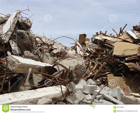 Large Concrete Chunks With Twisted Metal And Industrial Building Stock
