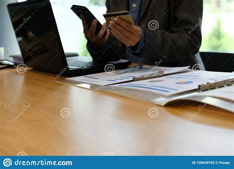 Is it safe to use credit card on smartphone. Man Holding Credit Card Using Smart Phone For Online Shopping. B Stock Photo - Image of mobile ...