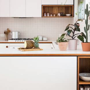 Not everyone who prefers modern over why laminate kitchen countertops deserve a second look. 75 Beautiful Mid-Century Modern Kitchen with Laminate ...