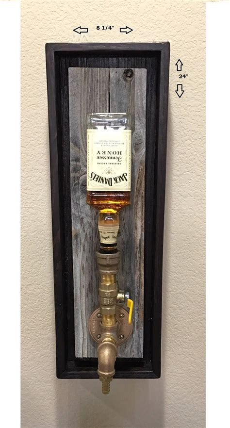 This diy project is a clever way to display. Junior Brass Wall Mount Liquor Dispenser by PRIMOBARS on Etsy | Liquor dispenser diy, Liquor ...