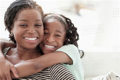 Black Mother And Daughter Hugging Stock Photo Dissolve