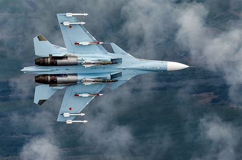 Russian Su 30sm Fighters Are Lifted Into The Air To Intercept Mock