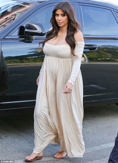 Amazing Stories Around The World Photos Busting Out Pregnant Kim Kardashian Struggles To