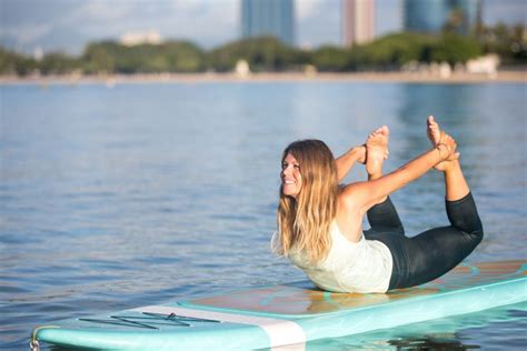 15 Beautiful And Relaxing Paddleboard Yoga Poses Instructions Included
