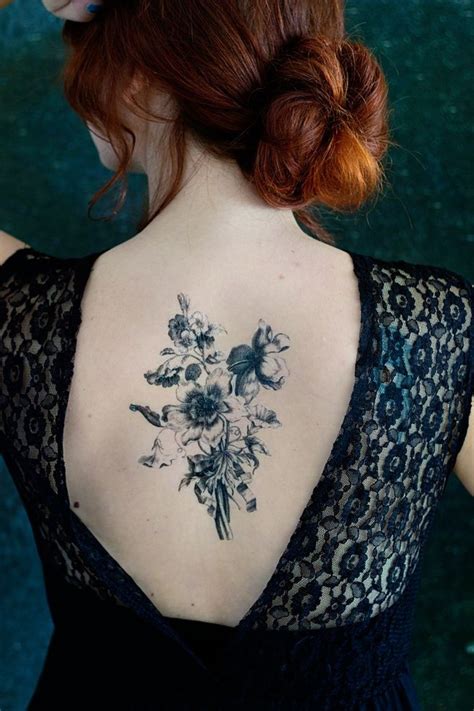 Awesome Black Bouquet Of Wildflowers Tattoo On Back Tattooimages