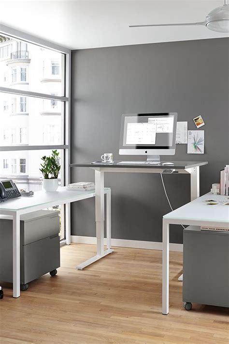 The convenient corner desk design gives you the workspace and storage you need without taking up too much room. stand up desk office layout - Google Search | Cheap office ...