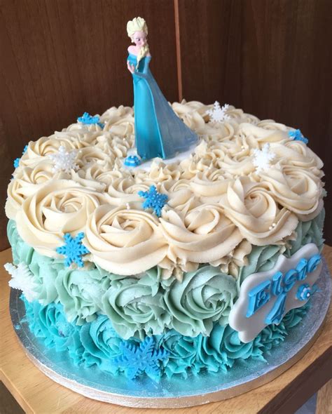 It really doesn't get any better than homemade birthday cake. Simple rose swirl Frozen / Elsa blue single tier birthday ...