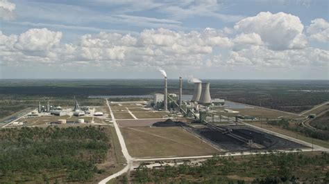 5k Stock Footage Aerial Video Fly Away From A Coal Fired Power