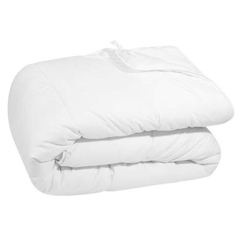 Avec cette couette 4 saisons, vous êtes sûr de profiter du confort dont vous avez besoin tout au long de l'année, aussi bien en été qu'en hiver. Double couette 4 saisons 240x260 | Maisons du Monde