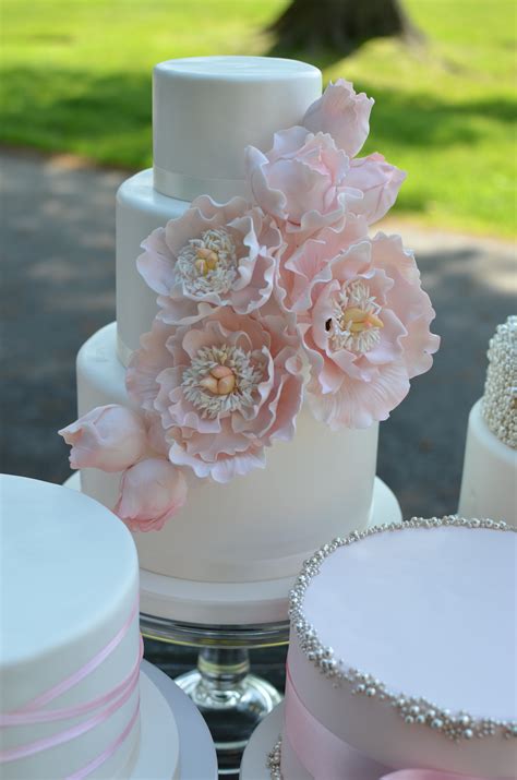 Blush And Silver Wedding Cakes With Sugar Peonies