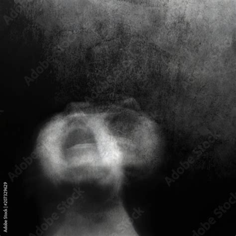 Scream Of Horror Screaming Woman Face Shot With Long Exposure Stock