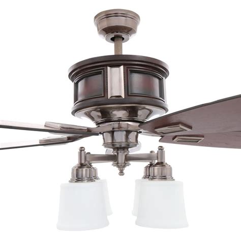 I don't see any company/model name on the fan but the remote says 'hampton bay fan & lighting company. Hampton Bay Garrison 52 in. Indoor Gunmetal Ceiling Fan ...