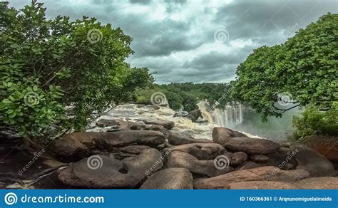 View Of The Kalandula Waterfalls On Lucala River Tropical Forest And