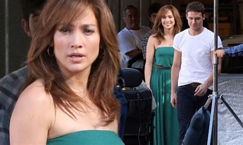 Jennifer Lopez Shows Off Her Famous Curves In A Clingy Green Maxi Dress