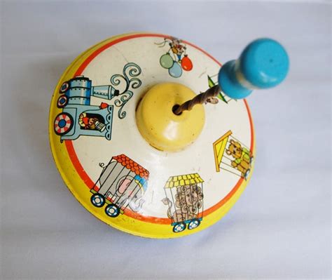 vintage spinning top toy ohio art circus theme bright colors