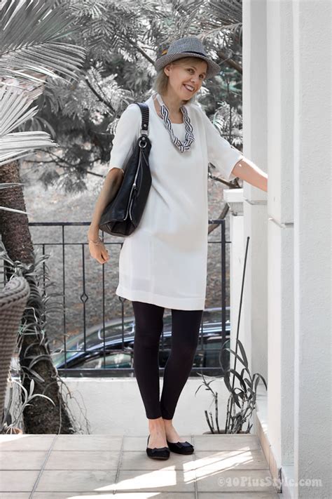 Wearing A White Dress With Black Leggings