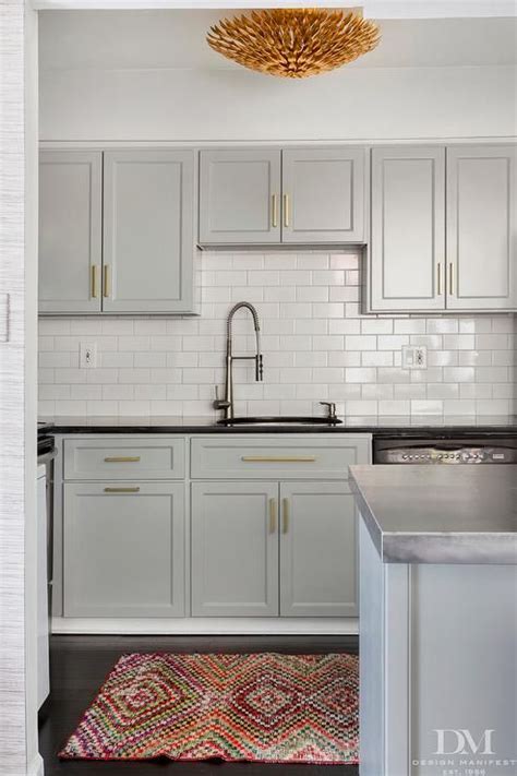 My new kitchen cabinets are a soft grey from lowe's, shenandoah! Kitchen cabinet paint color is Benjamin Moore Coventry Gray. Very versatile color with a warm ...