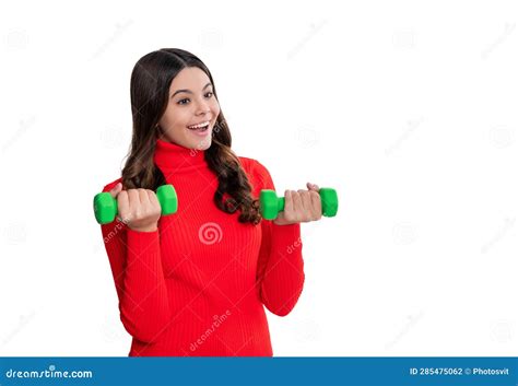 Strong Sport Girl Lifting A Barbell With Determination Teen Sport Girl Pushing Limits With A