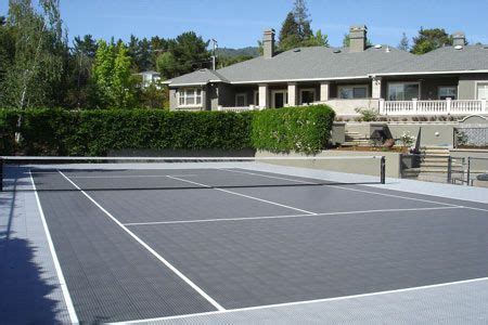 Installing a tennis court into your backyard can add serious value to your home! #PinMyDreamBackyard Backyard tennis court. | Tennis court ...