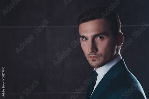 Portrait Of Handsome Bearded Man Wearing Black Suit Stock Photo And