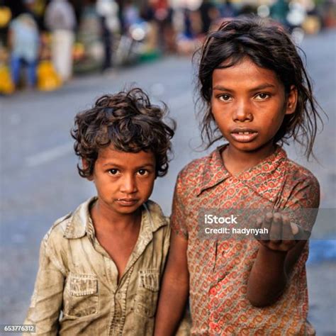 Poor Indian Children Asking For Help Stock Photo Download Image Now