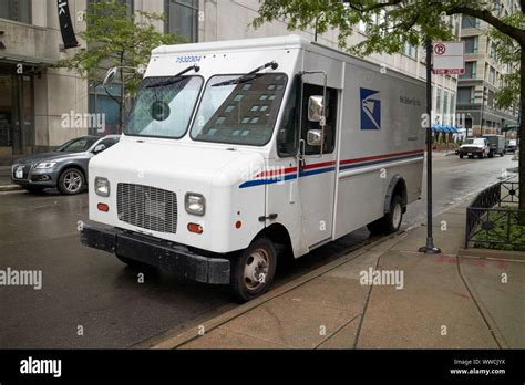 Usps United States Postal Service Delivery Truck Parked On Street In