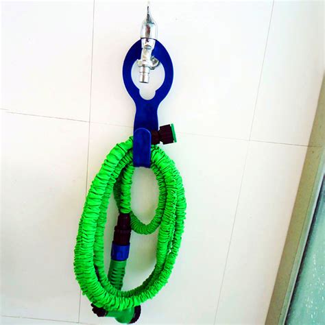 Storing your garden hose properly is so important. Hose Pipe Holder Outdoor Storage Hook Rack | 11street ...