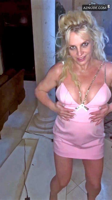 britney spears sexy and sultry photos flaunting her fit legs and hot tits in a tempting pink