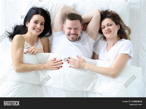 Man Two Women Lying Image Photo Free Trial Bigstock